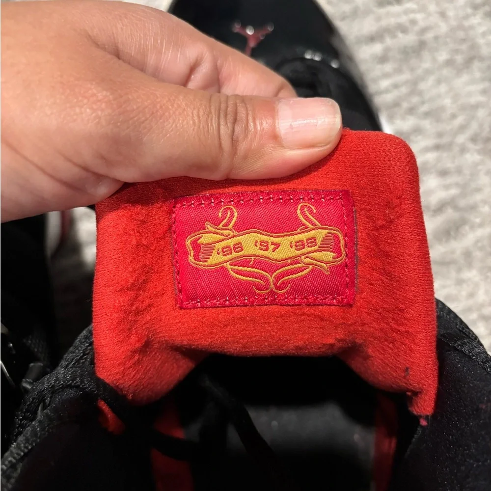 Air Jordan Black and Red Sneakers - Picture 3 of 6